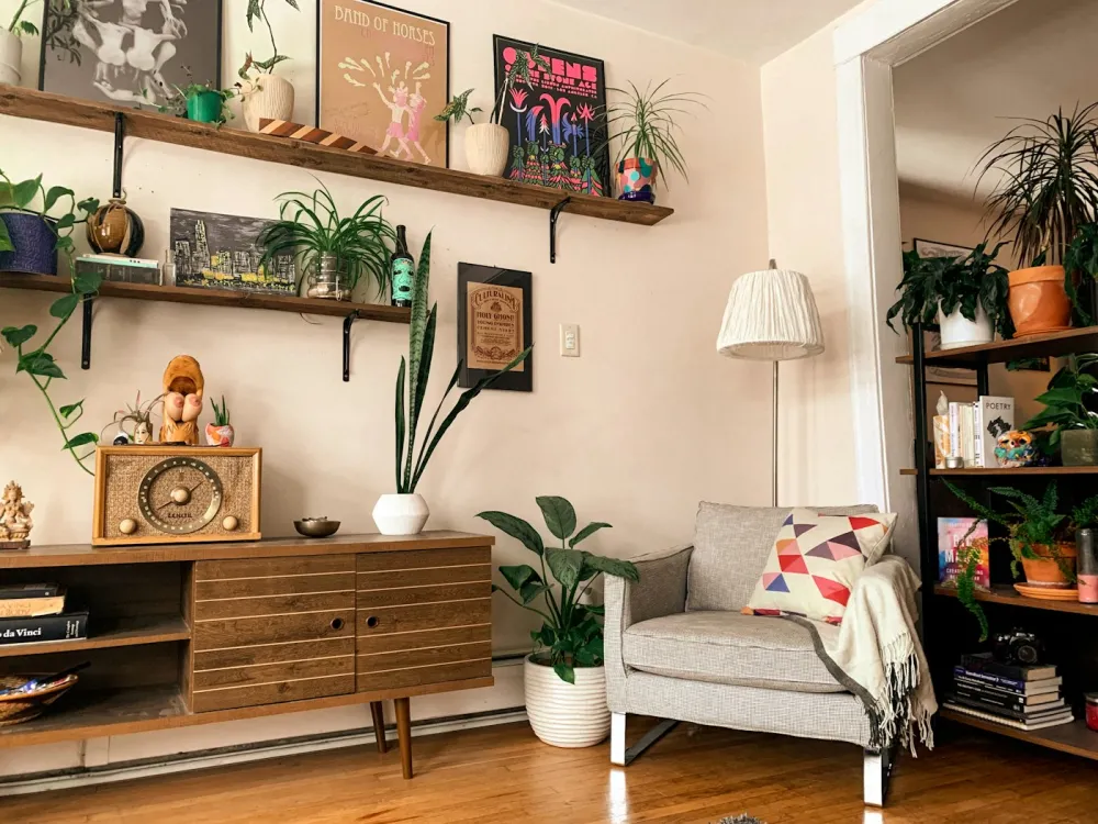 Walnut sideboard styled with plants and ceramics