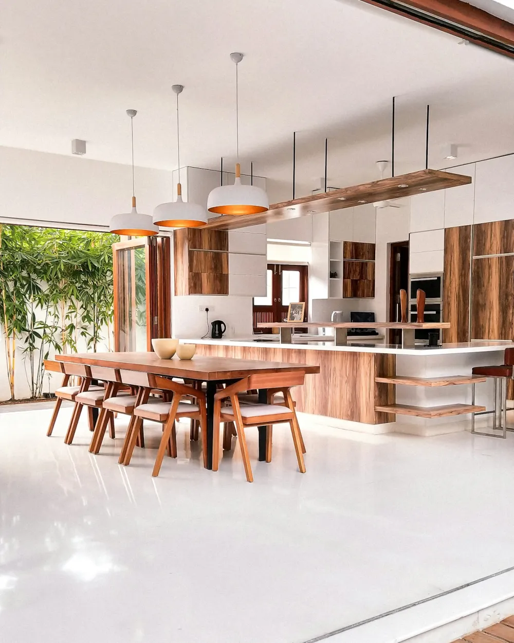 Scandinavian kitchen and dining space in pale wood